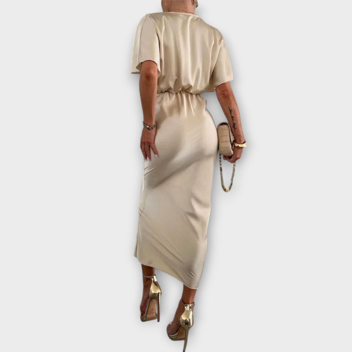 Sable - Robe maxi avec décolleté en V et nœud croisé en satin épais
