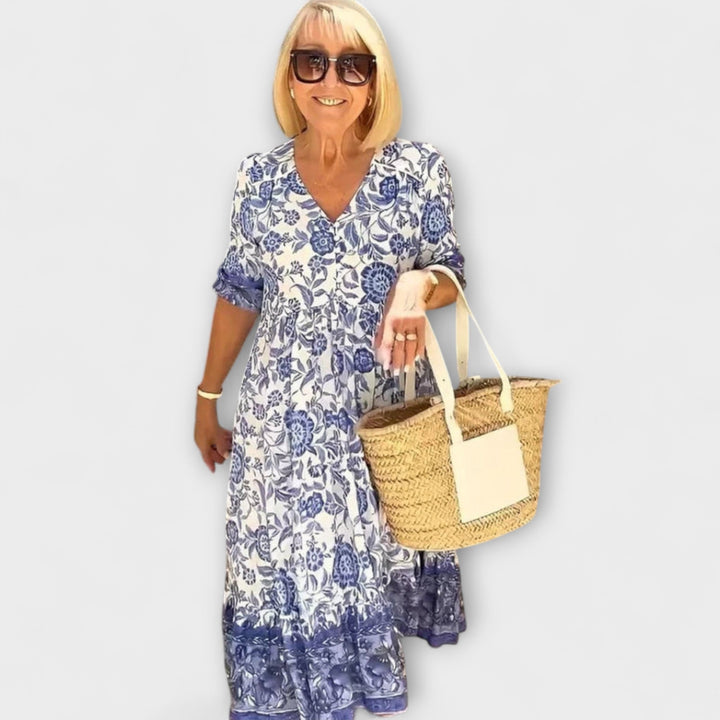 Caitlin - Robe fleurie élégante avec un design aérien