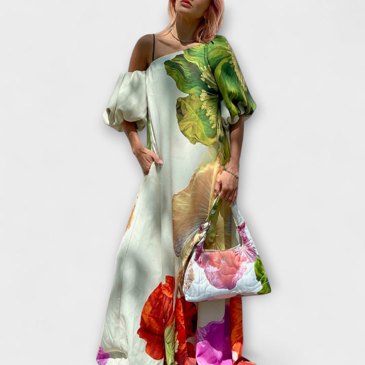 Skylar - Robe maxi à imprimé floral, décolleté asymétrique et manches ballons