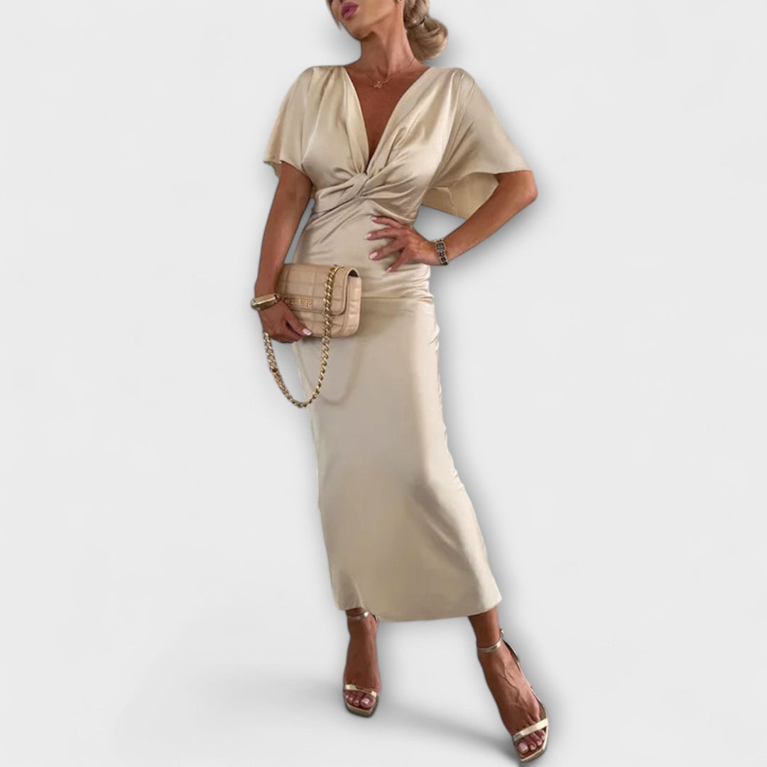 Sable - Robe maxi avec décolleté en V et nœud croisé en satin épais