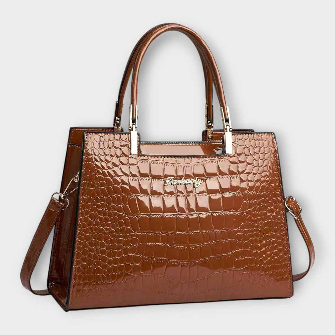 Cécile. - Sac à main brillant avec motif crocodile