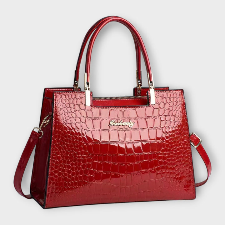 Cécile. - Sac à main brillant avec motif crocodile
