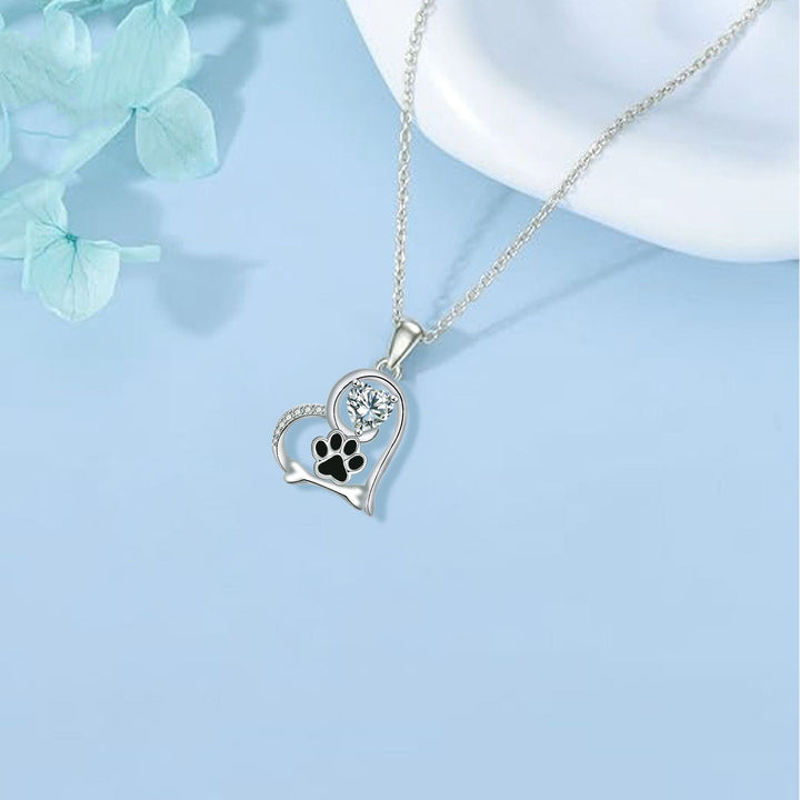 Collier fait main avec empreinte de patte de chien et os en zircon