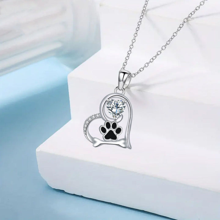 Collier fait main avec empreinte de patte de chien et os en zircon