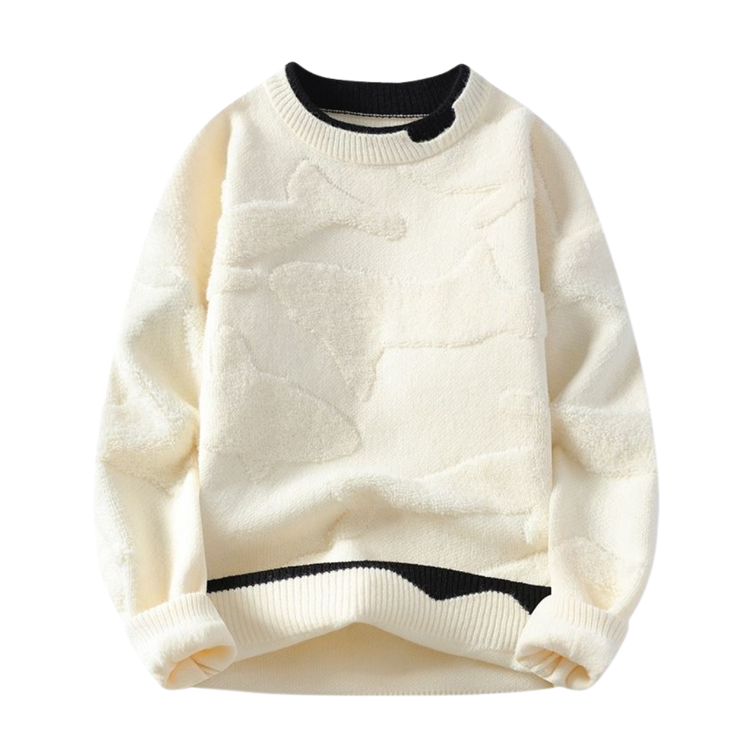 Pull avec motif texturé dans un style abstrait