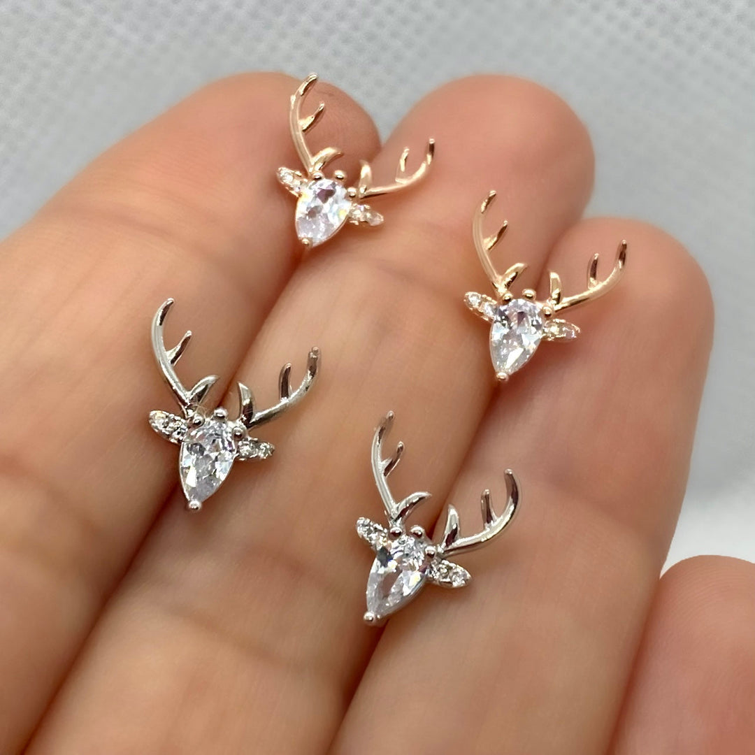 Boucles d'oreilles avec des bois et des zirconiums transparents