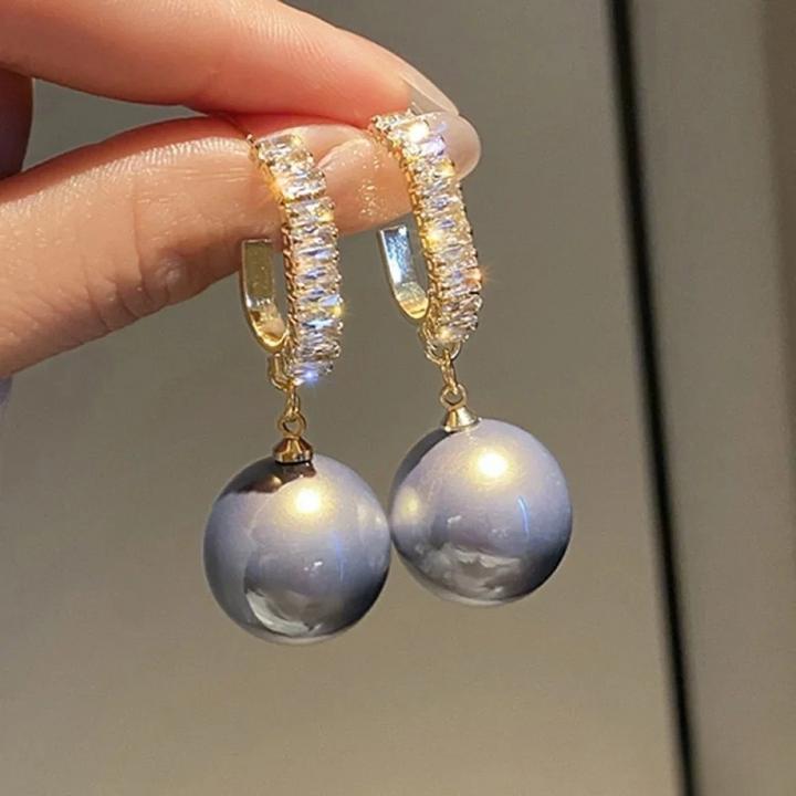 Boucles d'oreilles élégantes avec perles et zircon