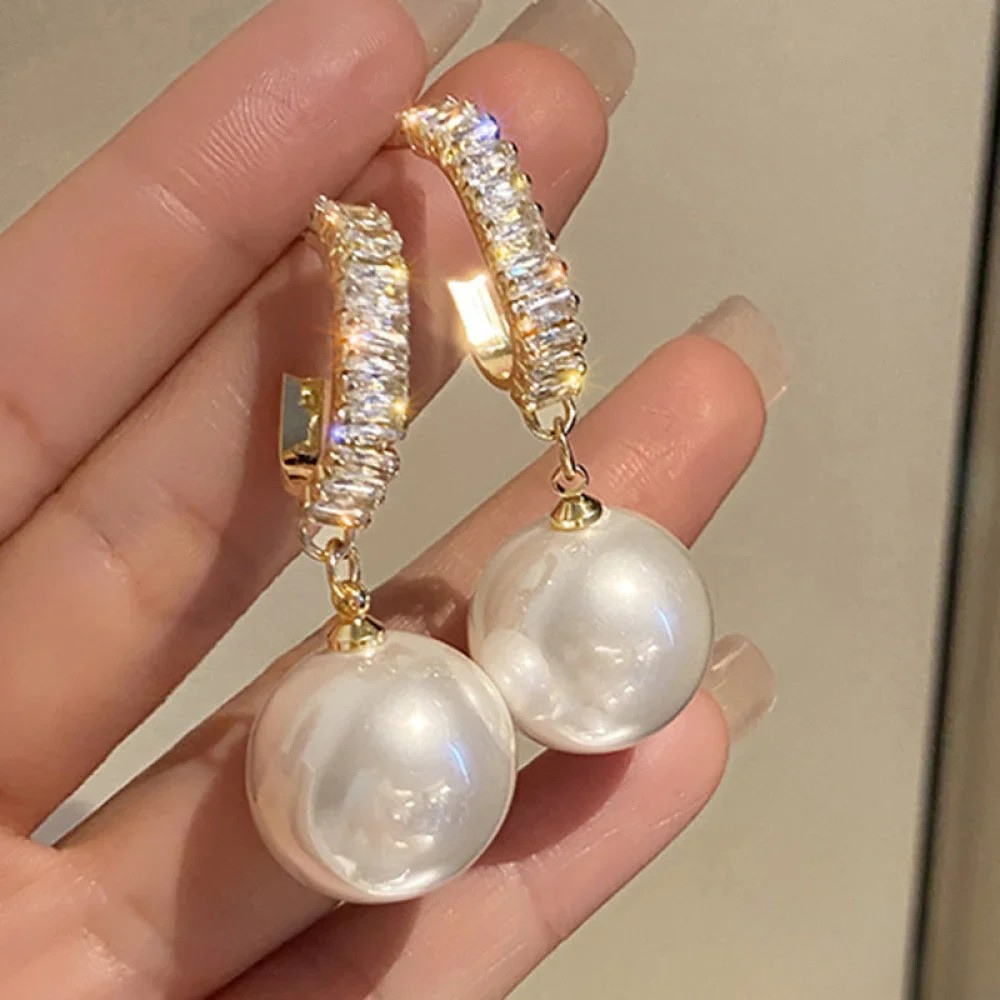Boucles d'oreilles élégantes avec perles et zircon
