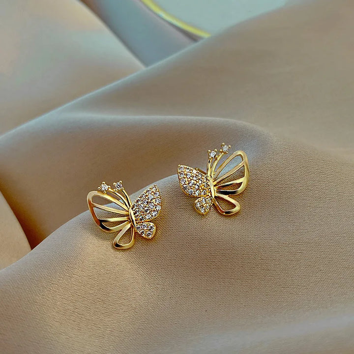 Boucles d'oreilles élégantes en forme de papillon avec des zircons