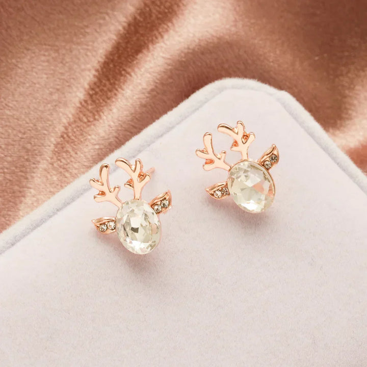 Boucles d'oreilles en métal avec un renne de Noël en cristal