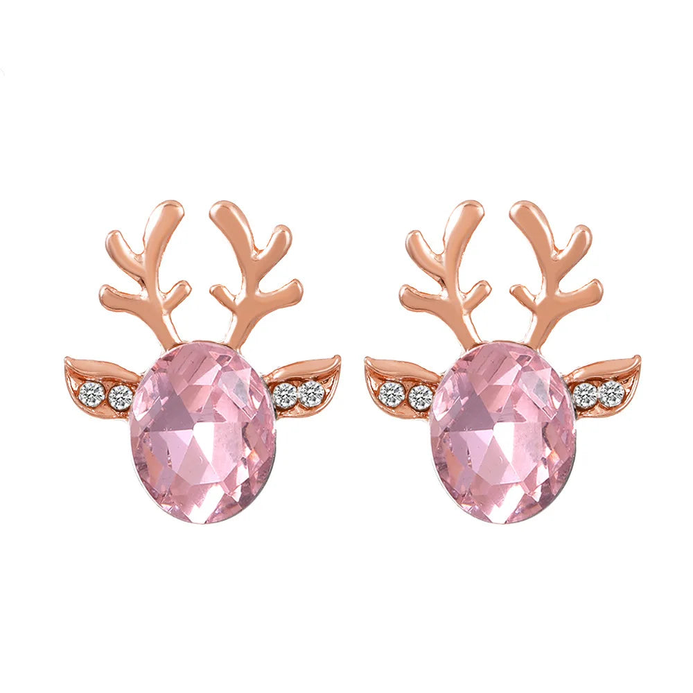 Boucles d'oreilles en métal avec un renne de Noël en cristal