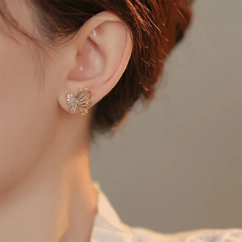 Boucles d'oreilles élégantes en forme de papillon avec des zircons
