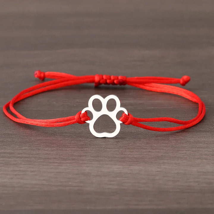 Bracelet avec cordon et empreinte de patte – Design ajustable en noir et rouge