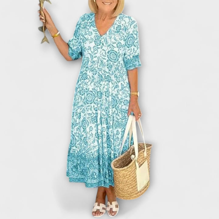 Caitlin - Robe fleurie élégante avec un design aérien