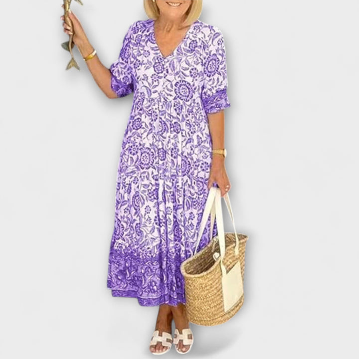 Caitlin - Robe fleurie élégante avec un design aérien