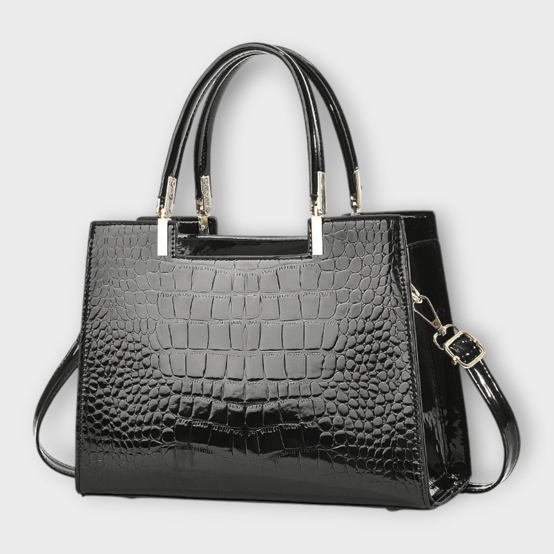 Cécile. - Sac à main brillant avec motif crocodile