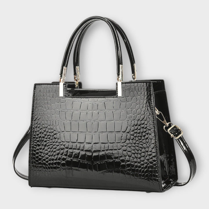 Cécile. - Sac à main brillant avec motif crocodile