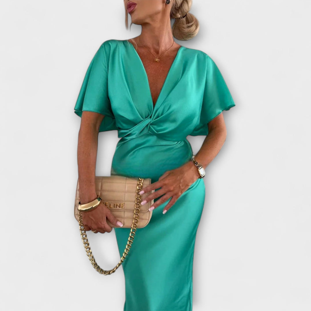 Sable - Robe maxi avec décolleté en V et nœud croisé en satin épais