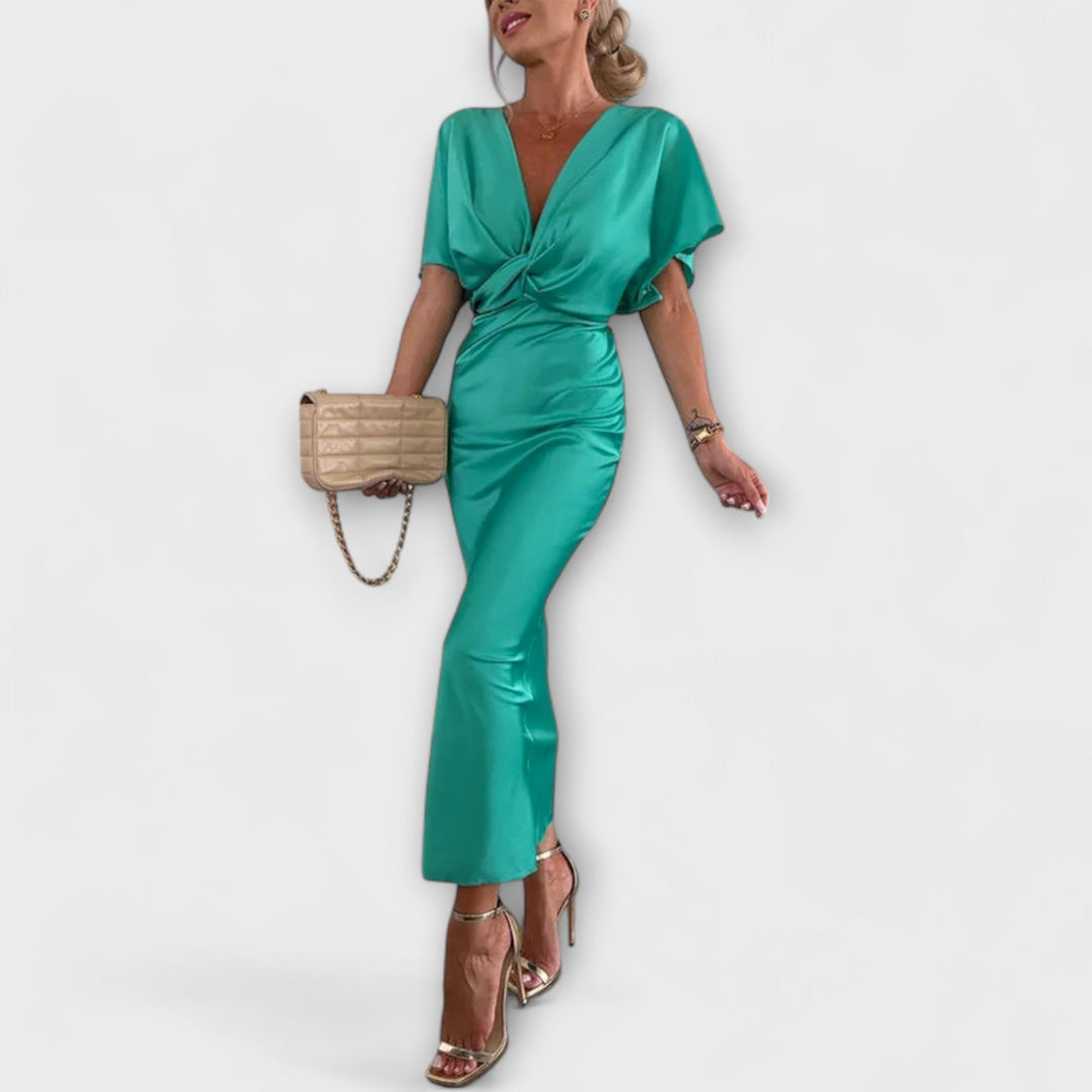Sable - Robe maxi avec décolleté en V et nœud croisé en satin épais
