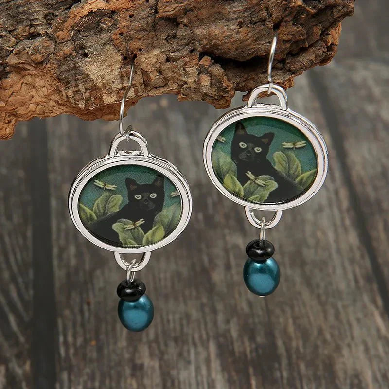 Boucles d'oreilles pendantes vintage avec chat noir tropical
