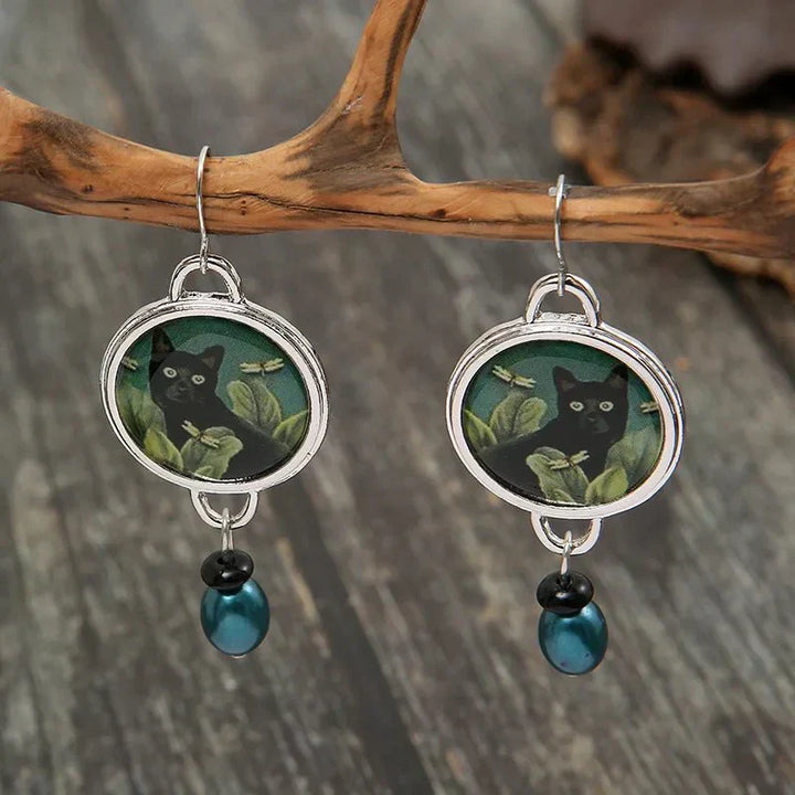 Boucles d'oreilles pendantes vintage avec chat noir tropical