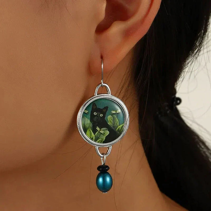 Boucles d'oreilles pendantes vintage avec chat noir tropical